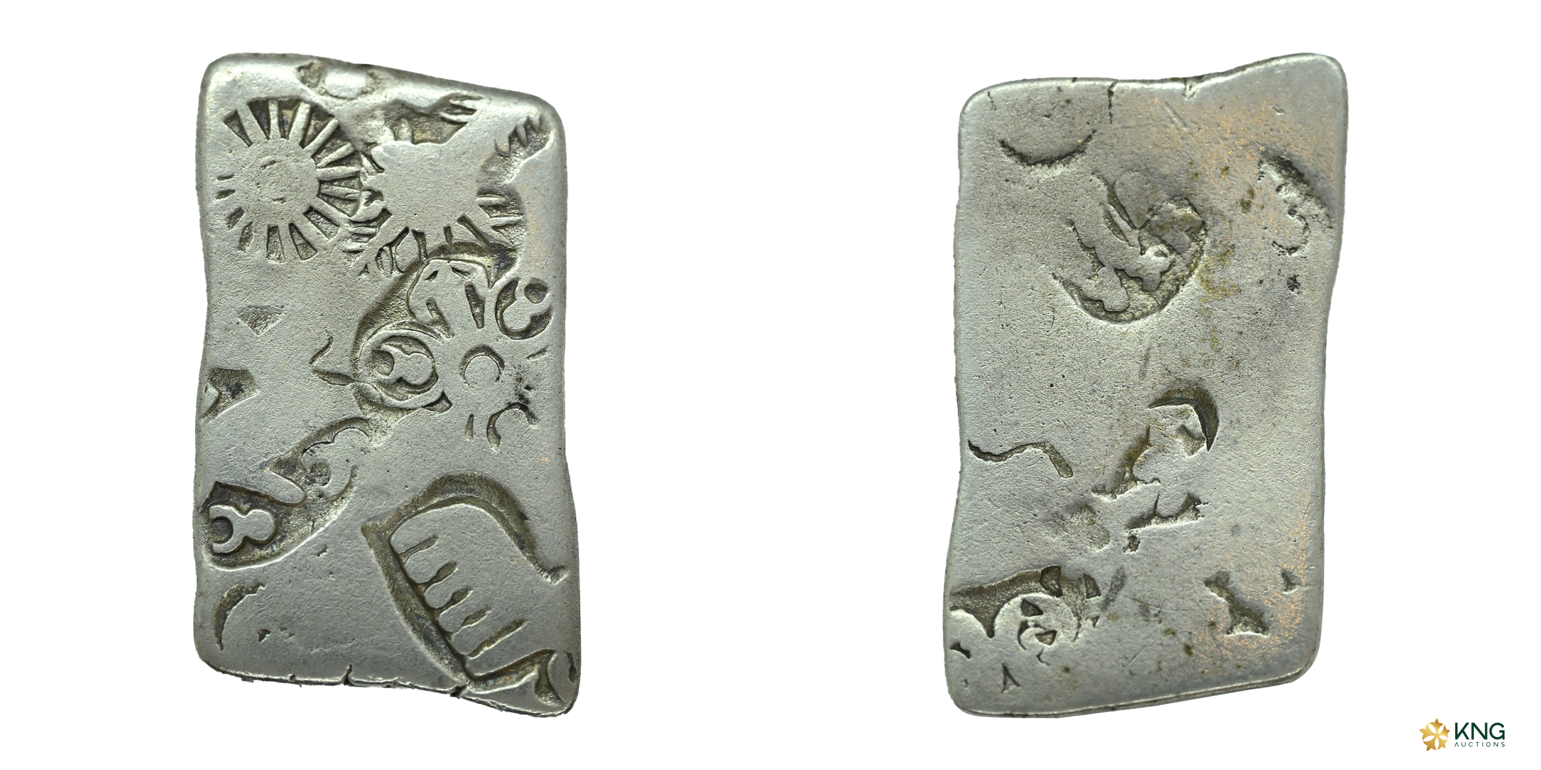 Punch-Marked, Mauryan Empire , silver karshapana (2.88 g, 13.45 × 22.13 mm). Obv: Six-arme